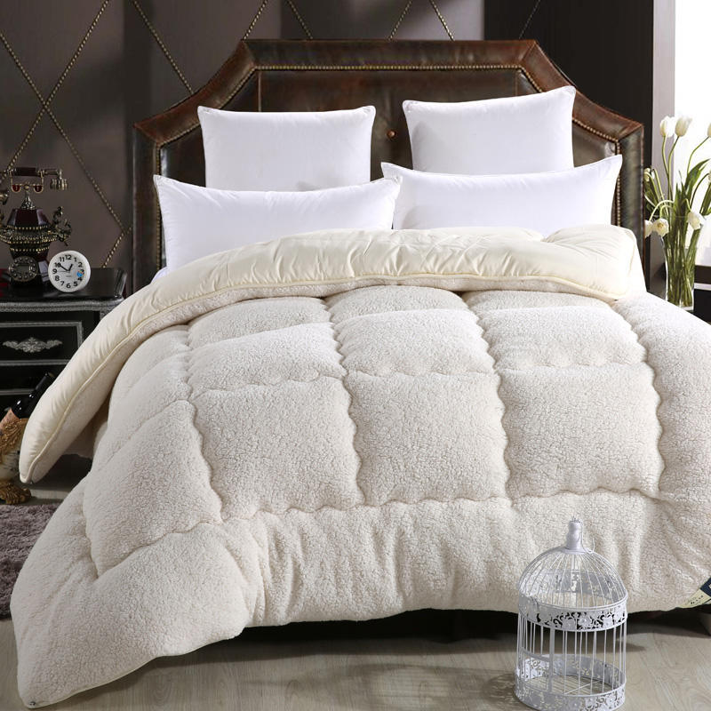 Cashmere blanket in a soft, luxurious fabric, displayed flat for a clear view of its texture and design