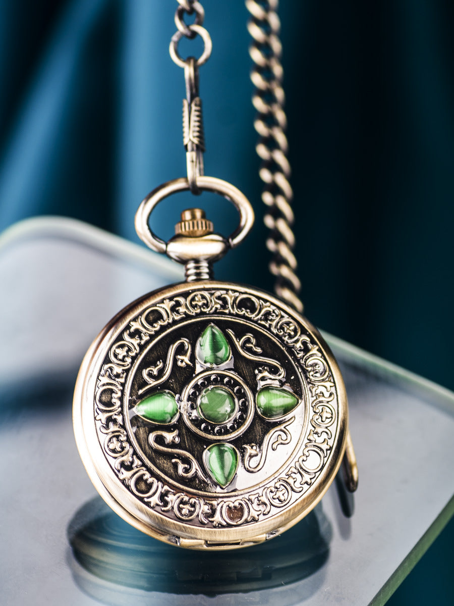 Retro flip-open mechanical pocket watch with classic vintage design and visible metal casing
