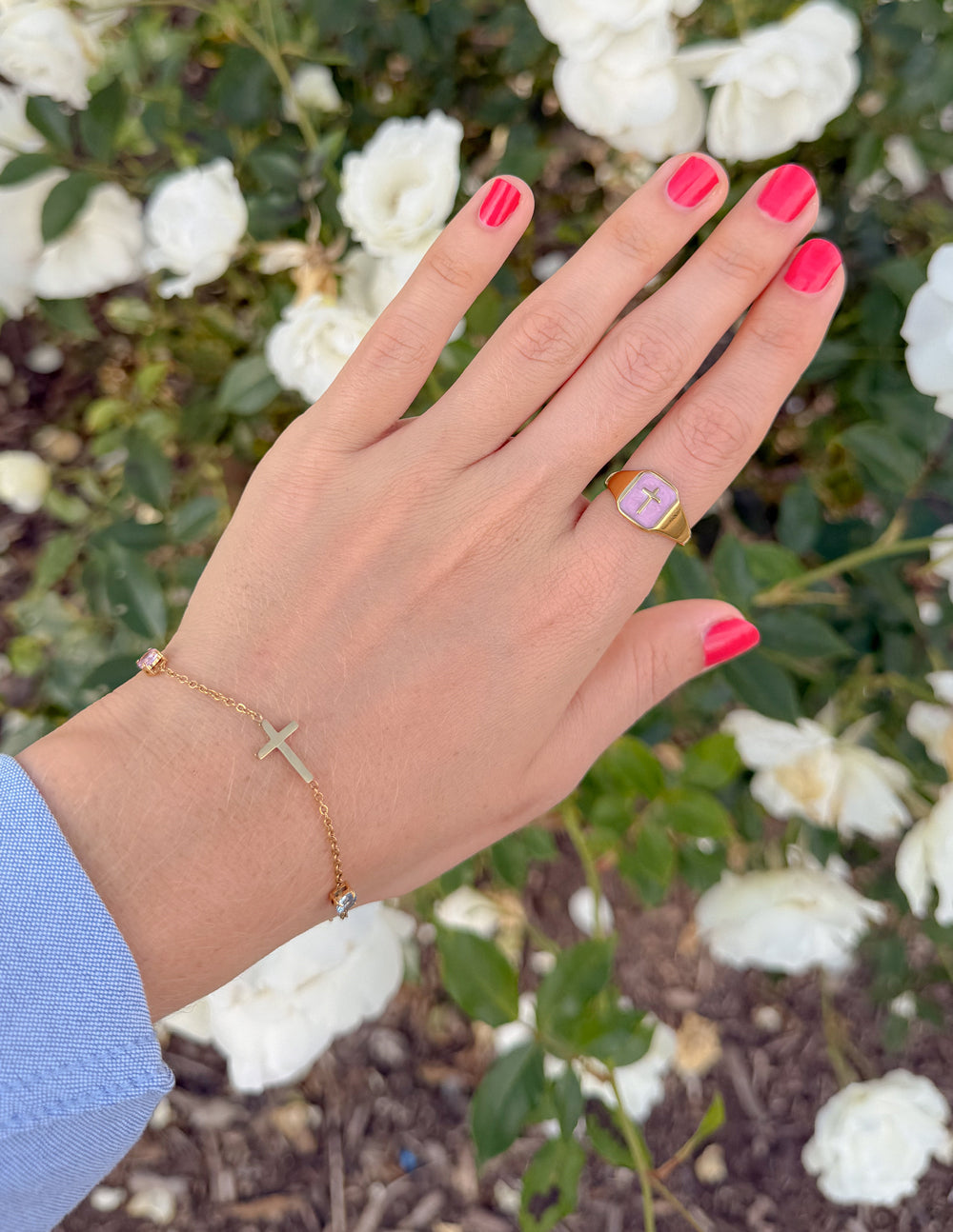 Lilac enamel cross ring by Elevated Faith featuring a delicate silver band and vibrant purple cross design.