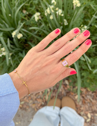 Lilac enamel cross ring by Elevated Faith featuring a silver band and a detailed cross design for a stylish religious accessory.