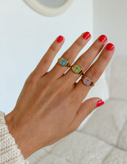 Lilac enamel cross ring by Elevated Faith featuring a silver band and detailed religious cross design.