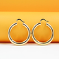 MIA Jewelry 18K gold-filled thick lever back hoop earrings and open hoop studs, showcasing shiny gold jewelry with a secure clasp