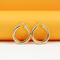 MIA Jewelry 18K gold filled thick lever back hoop earrings with open hoop design, stylish and elegant jewelry accessory.