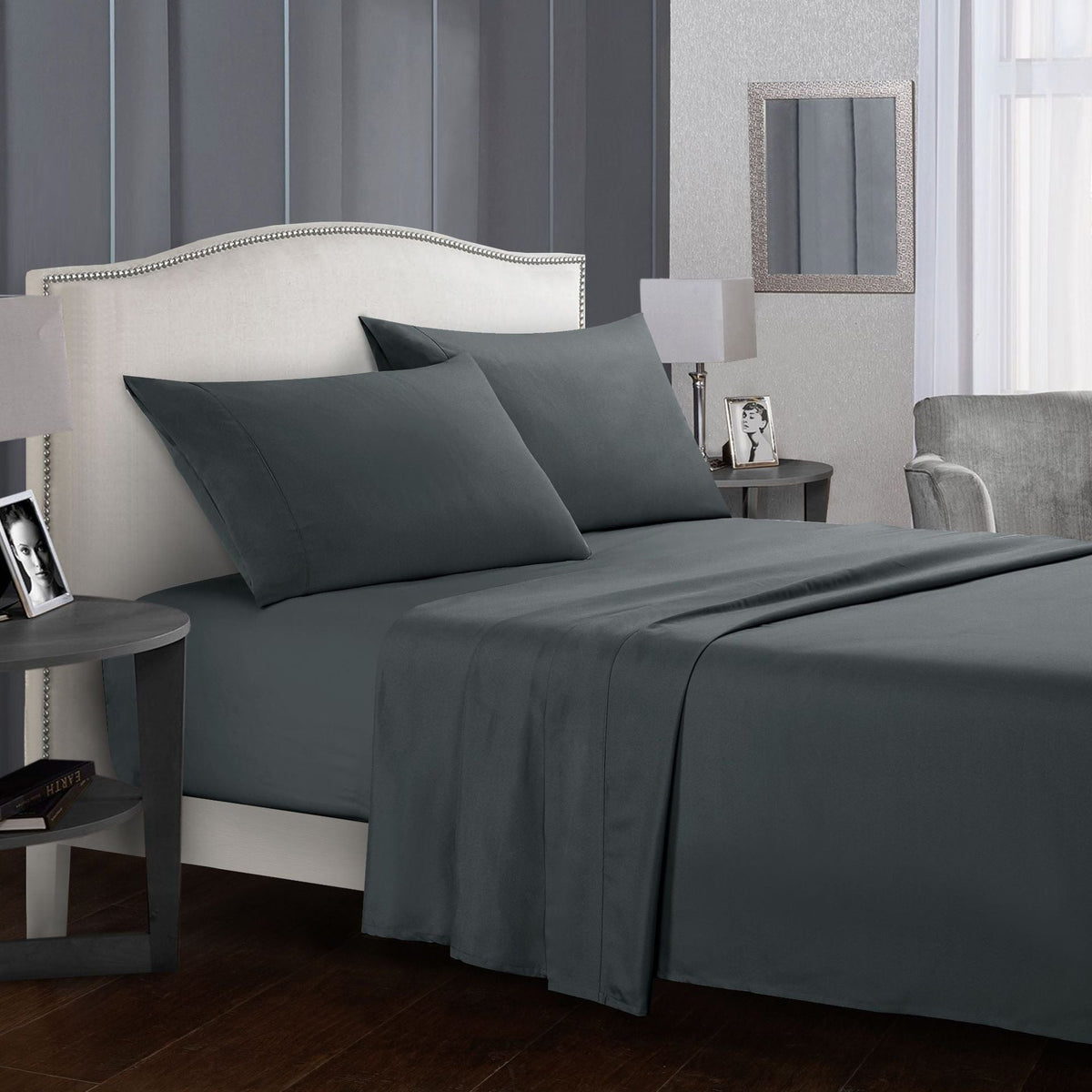 Four-piece bed sheet set by My Store, showing coordinated sheets and pillowcases in a neatly arranged bedding set