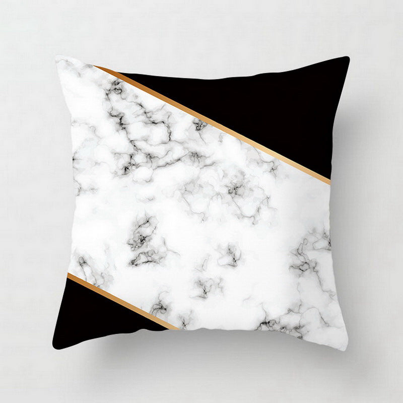 Pink geometric abstract decorative pillowcase with modern geometric pattern beyond.