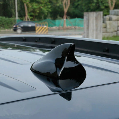Black car shark fin antenna exterior view