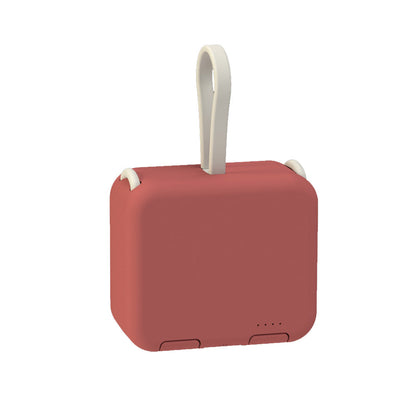 Handbag back clip battery power bank in compact black design with a secure clip for convenient charging on the go