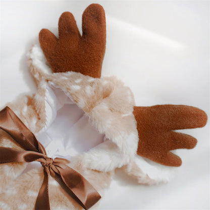Christmas pet clothing elk cape cloak on a dog, festive red and green design with antler details