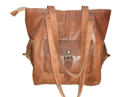 Handmade women's shoulder bag with adjustable strap, featuring a stylish, crafted design for everyday use.