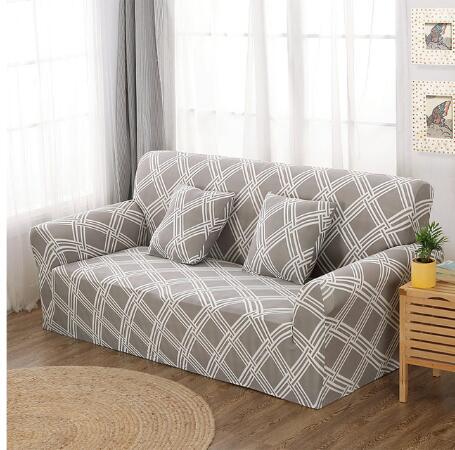 Elastic universal sofa cover in a neutral color, designed to fit most sofas.