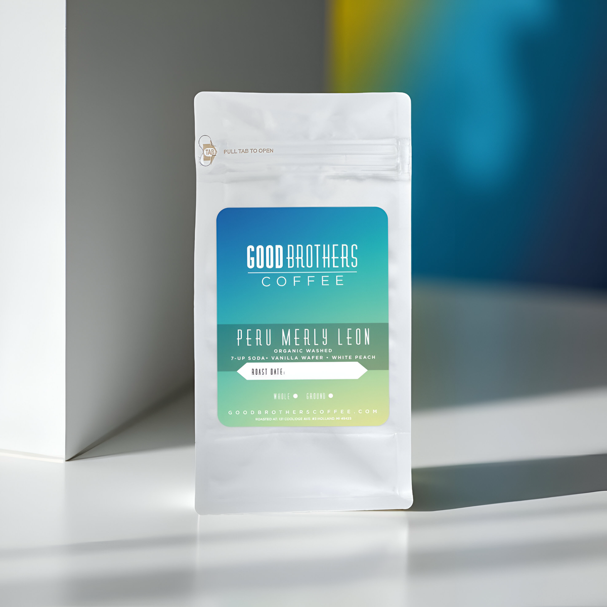 Roasted organic Peru Aromas del Valle Merly Leon G1 coffee beans by Good Brothers Coffee LLC, displayed in a clear bag.
