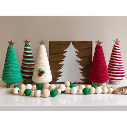 Christmas layout mini Christmas tree decorations arranged in a festive display