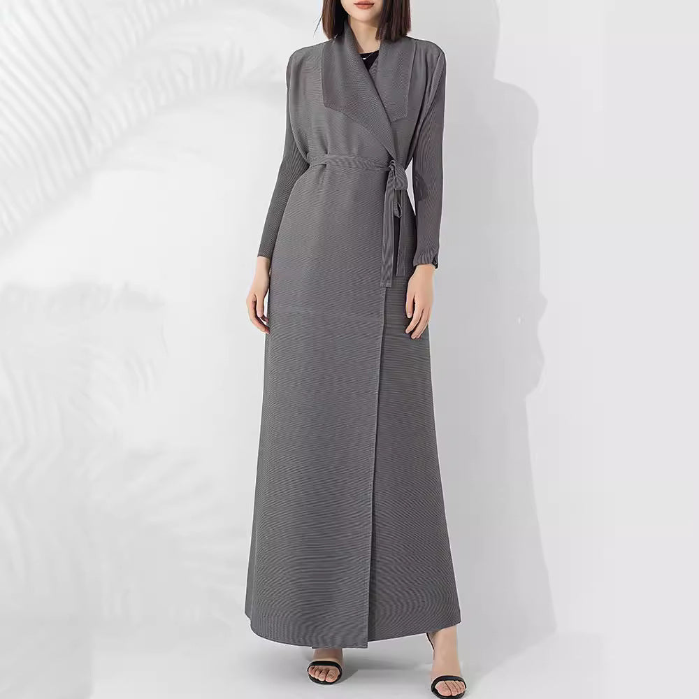 Graceful fashionable long trench coat for women, elegant full-length outerwear design