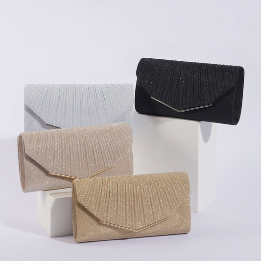 Vintage women's evening clutch with flap and pillow design for parties and banquets
