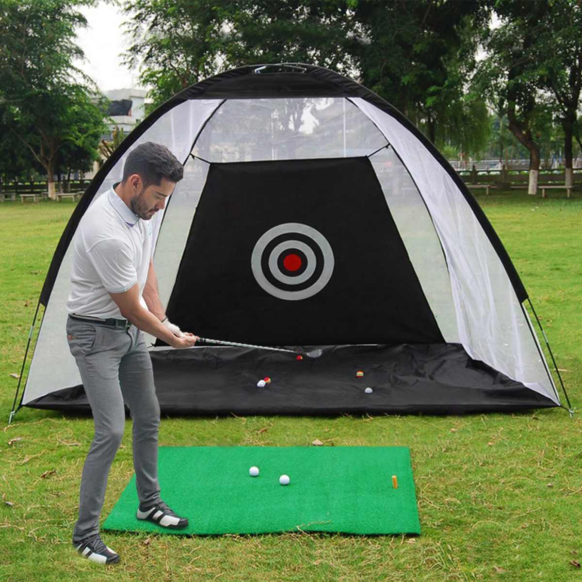 Golf practice net tent hitting cage with mesh enclosure on grass for outdoor training