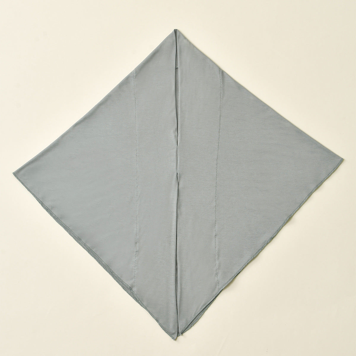 Women's versatile highly elastic soft ethnic headscarf, folded fabric accessory in a neutral color