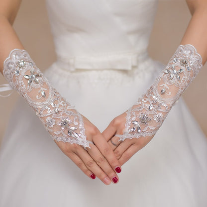 Mother wedding dress gloves displayed in white satin with elegant bridal detailing