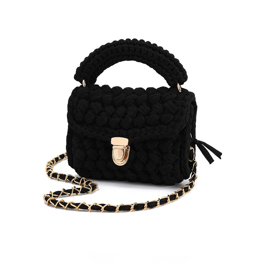 Handwoven women's minimalist tote bag in natural woven texture with sturdy handles