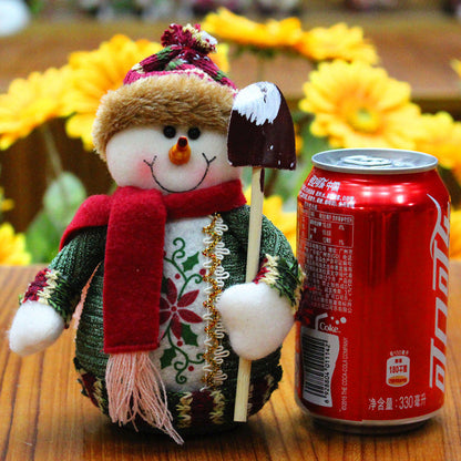 Christmas elk, Santa Claus, and snowman holiday decorations displayed together by My Store