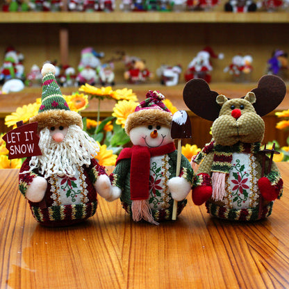 Christmas elk, Santa Claus and snowman holiday decorations displayed together by My Store