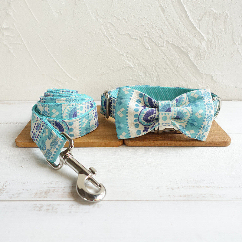 Pet bow tie collar displayed for dogs and cats, featuring a decorative bow tie design