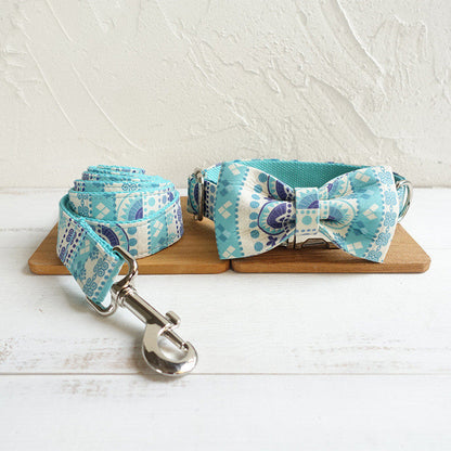 Pet bow tie collar displayed for dogs and cats, featuring a decorative bow tie design