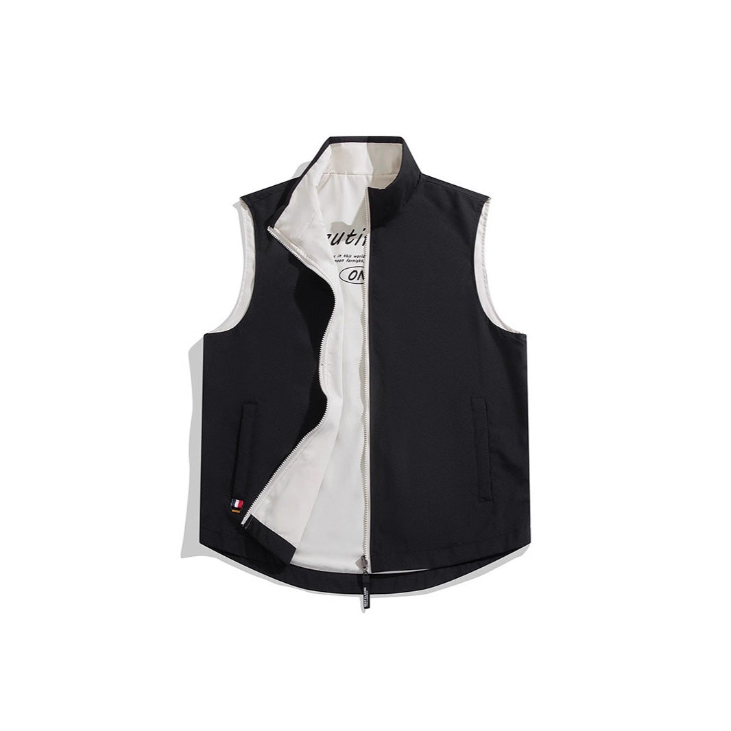 Color-block reversible vest jacket with contrasting panels and sleeveless design