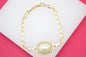18K gold filled synthetic pearl bracelet by MIA Jewelry featuring elegant design and lustrous pearls on a delicate chain.
