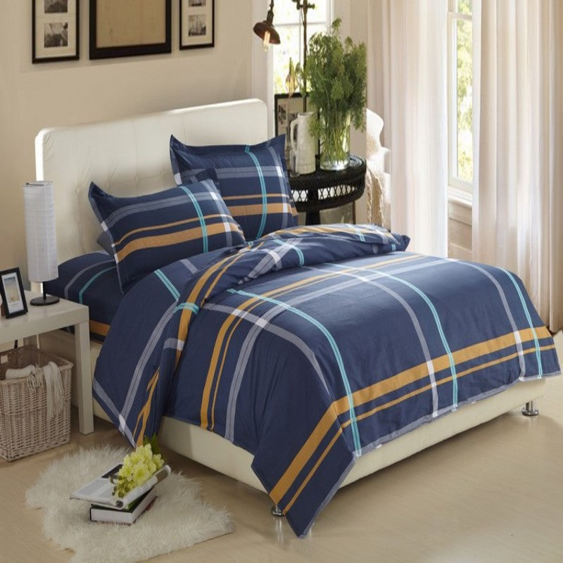Four-piece cotton bedding set in soft home textile fabric, featuring a coordinated sheet and pillowcases