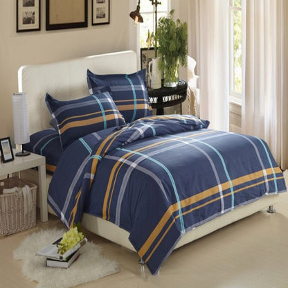 Four-piece cotton bedding set in soft home textile fabric, featuring a coordinated sheet and pillowcases