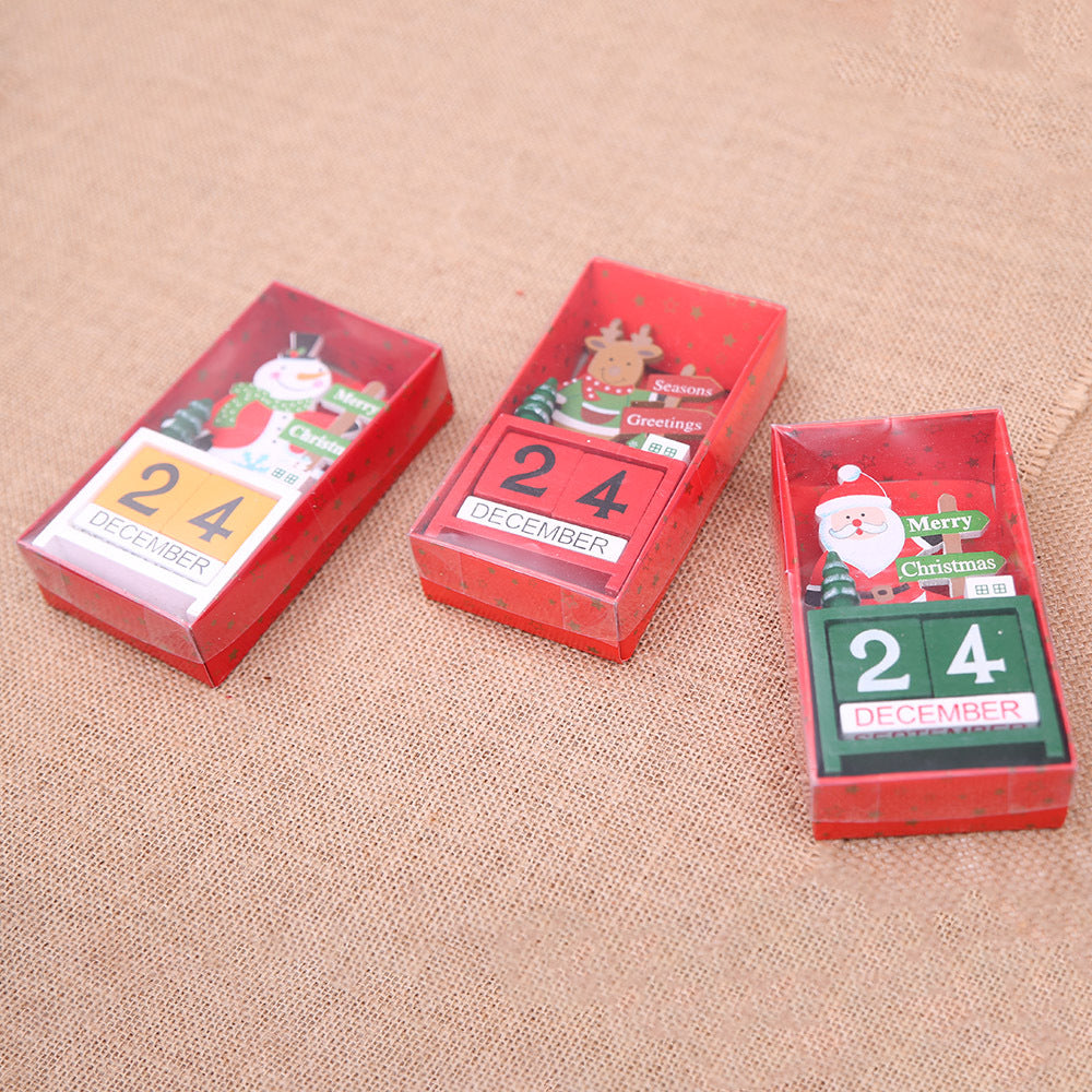 Christmas wooden calendar decorations displayed in festive seasonal designs