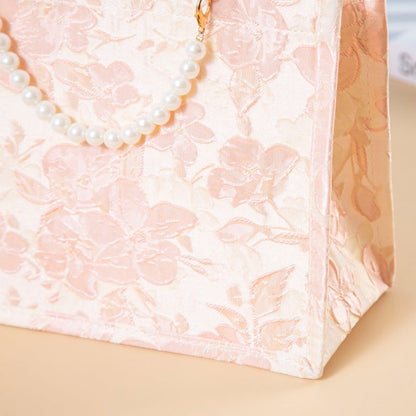 Relief-printed souvenir canvas gift bag with textured design and sturdy handles