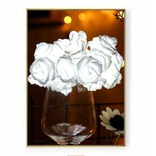 LED rose flower lights with glowing blossoms and green stems; decorative floral lighting display