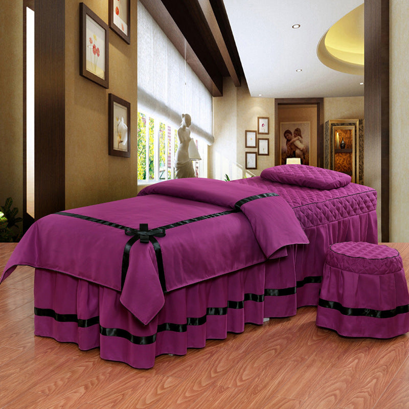 Beauty bed salon bed cover in white fabric, fitted over a professional beauty treatment bed