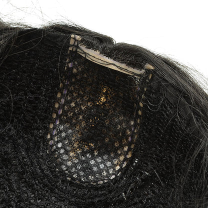African short curly headgear with textured curls in a natural, voluminous style