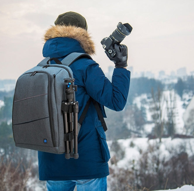 Waterproof camera backpack with padded compartments and adjustable shoulder straps