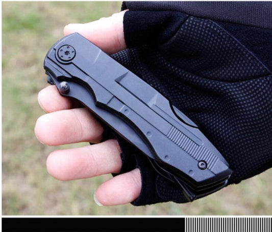 Portable multi-purpose folding knife and pliers tool for outdoor travel use, stainless steel design viewed closed
