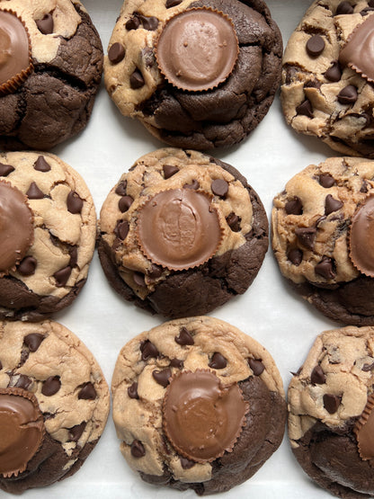 Two chocolate Get Baked Brownie Cookies from Let's Get Baked Artisan Desserts on a white plate.