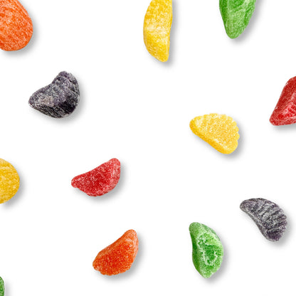 Assorted fruit-flavored candy slices from Candy In Bulk in a large value bag, colorful and chewy fruit candies for snacking.