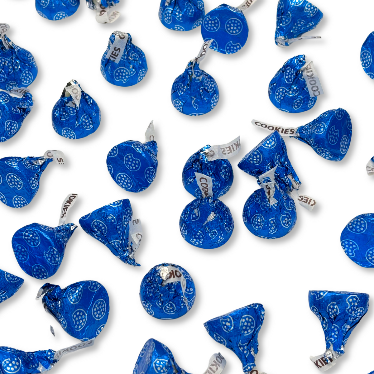 Hershey's Kisses Cookies 'n' Creme chocolate candies from Candy In Bulk in a bulk value bag, showing silver foil-wrapped chocolates.