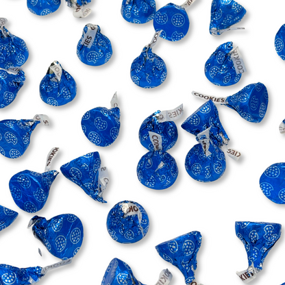 Hershey's Kisses Cookies 'n' Creme chocolate candies from Candy In Bulk in a bulk value bag, showing silver foil-wrapped chocolates.