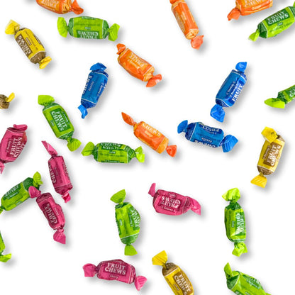 Assorted Tootsie Roll Fruit Chews in a bulk Candy In Bulk bag, featuring colorful fruit-flavored chewy candies.