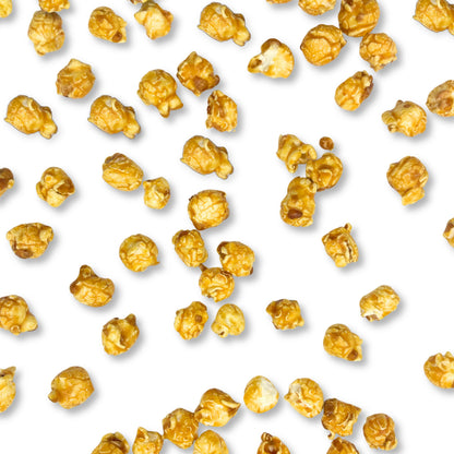 Caramel coated popcorn snack in a large bulk bag from Candy In Bulk, showing golden caramel-covered popcorn pieces.