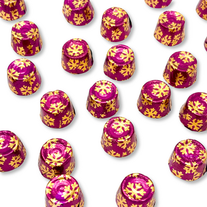 Dark chocolate Rolo salted caramel candies wrapped in festive Christmas foil, bulk value bag from Candy In Bulk.