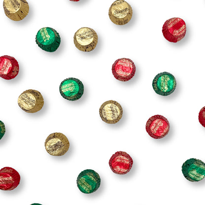 Two Reese's Miniature Milk Chocolate and Peanut Butter Cups in Christmas foil wrappers from Candy In Bulk.