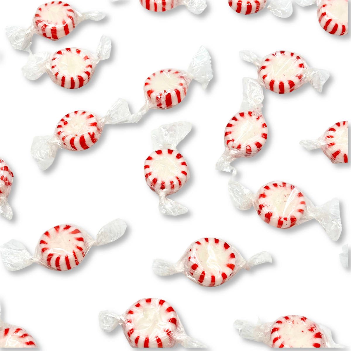 Two peppermint hard candies from Candy In Bulk Starlight Peppermint collection in a clear bag.