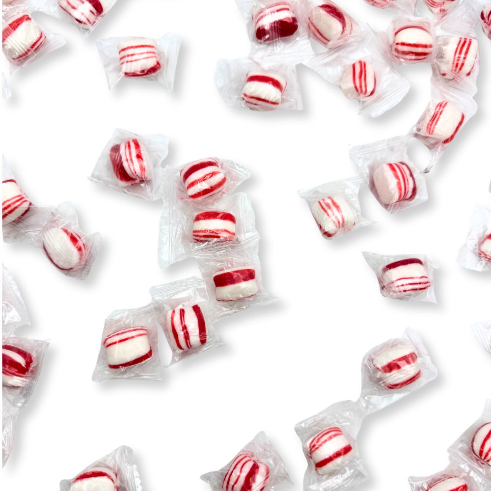 Two individually wrapped Peppermint Twist Hard Candies from Candy In Bulk in a bulk value bag.