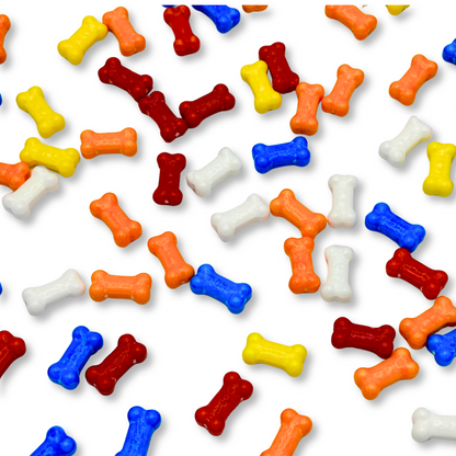 Assorted hard candies in bone shapes from Candy In Bulk, colorful and packaged in a bulk value bag.