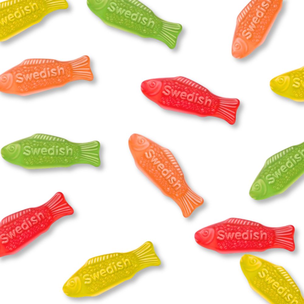 Assorted Swedish Fish soft and chewy candy from Candy In Bulk in a bulk value bag, showing colorful fish-shaped candies.