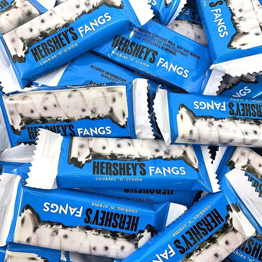 Two Hershey's Cookies 'n' Cream Fangs snack size chocolate bars from Candy In Bulk, individually wrapped in a bulk value bag.